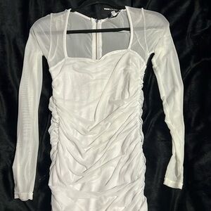 Brand new fashion nova short dress. Size medium in white.